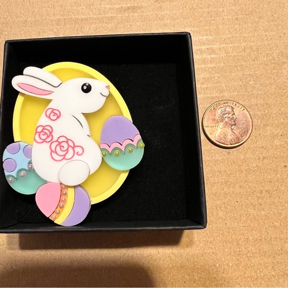The Makings Of Miss Jones bunny with decorated eggs acrylic brooch - Picture 2 of 3